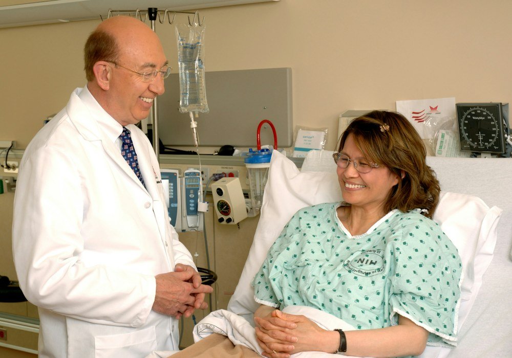 Stock photo of a doctor talking with a patient during a clinic visit